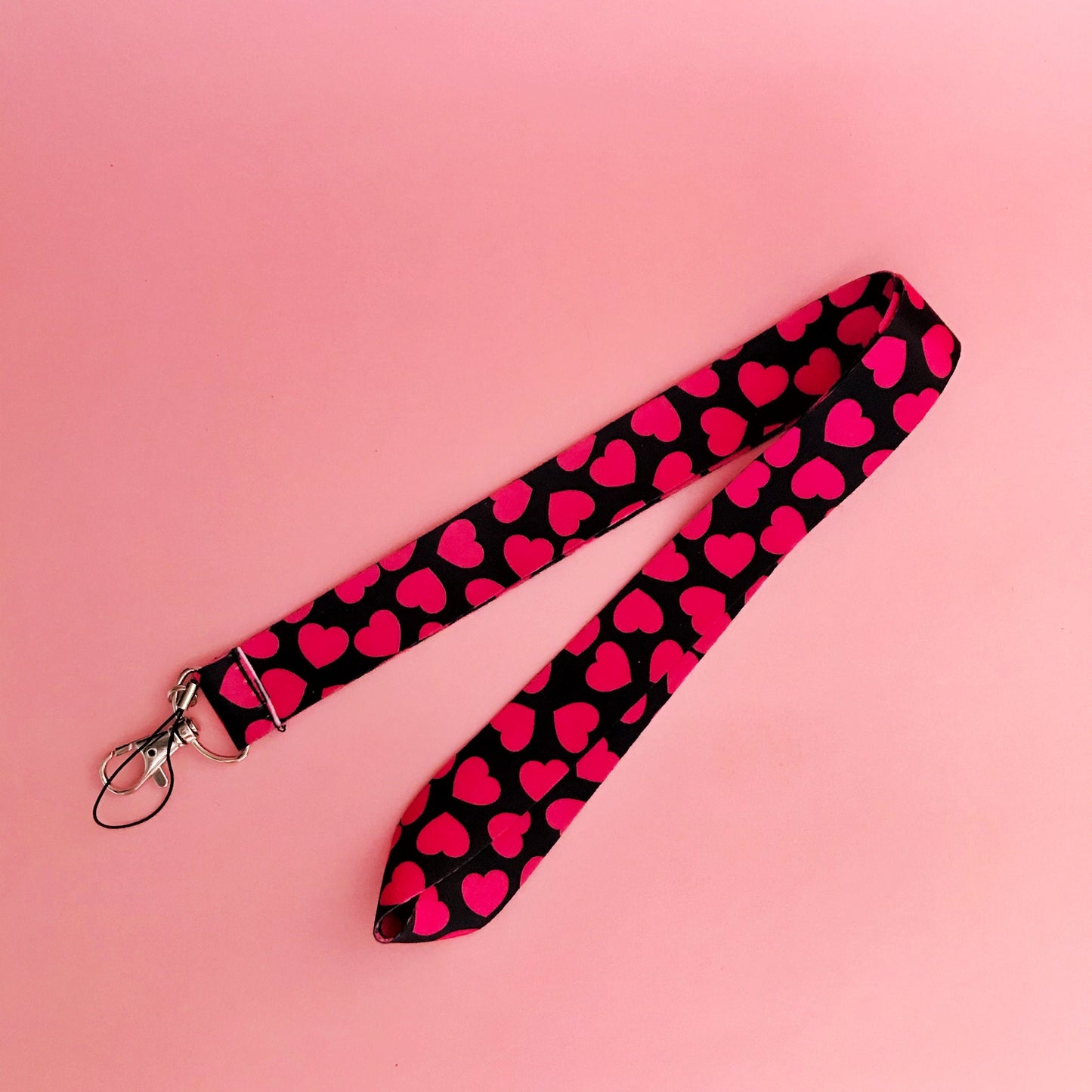 Corazones negro fucsia