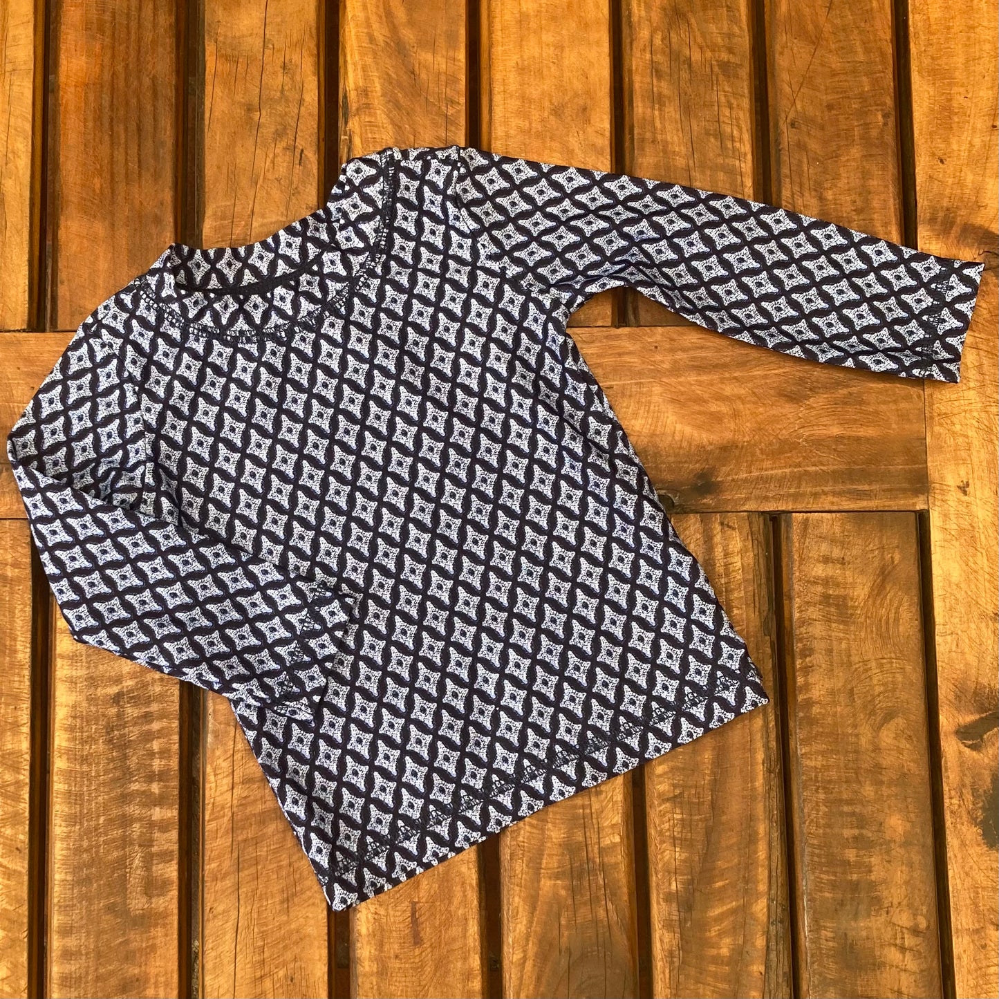 Polera azul 12 meses.
