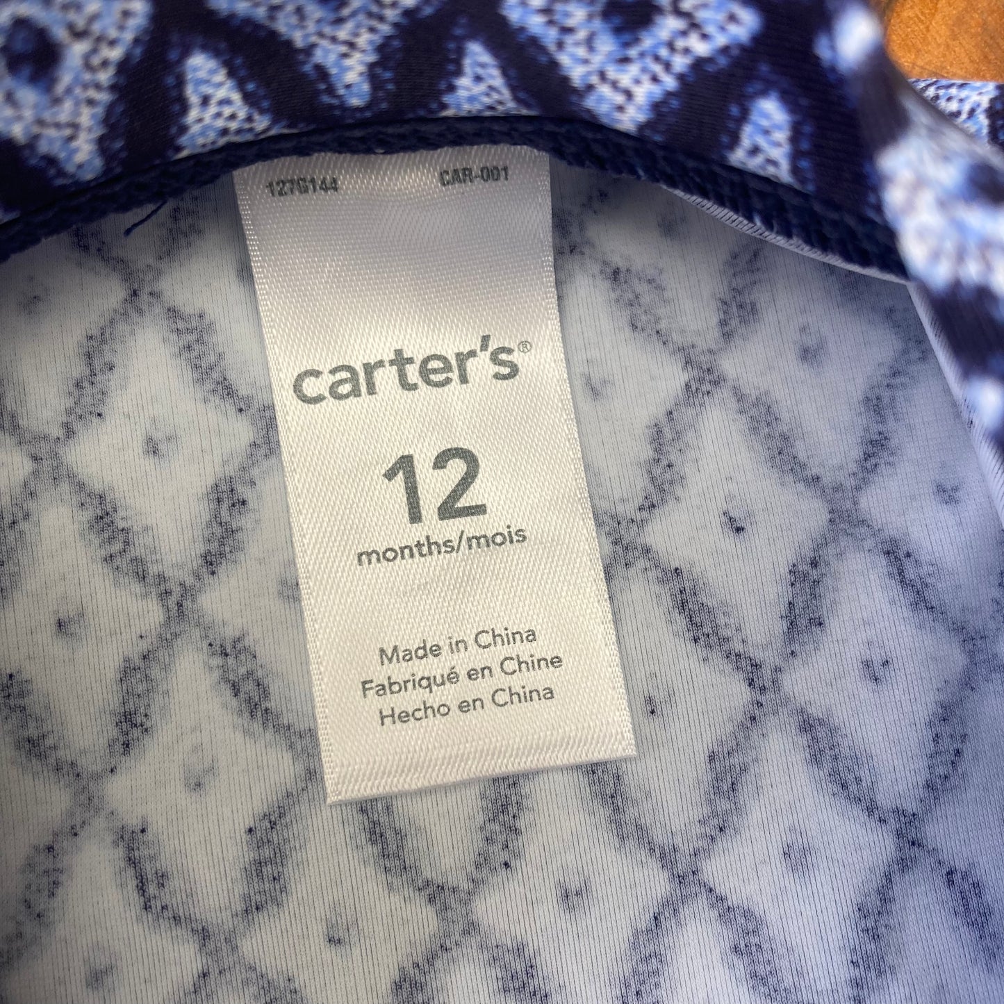 Polera azul 12 meses.